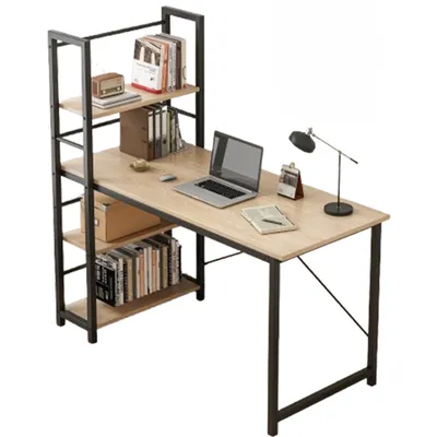 A computer desk with shelves, a laptop, books, and a lamp.