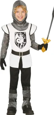 A young boy dressed in a knight costume, holding a toy sword.