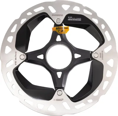 A bicycle brake rotor is shown against a white background.