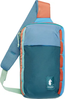 A colorful sling bag against a white background.
