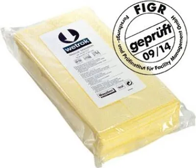 A stack of yellow cloths in plastic packaging, with a certification stamp.