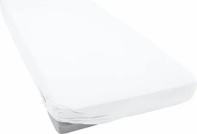 A white fitted sheet is shown on a mattress, with the sheet pulled taut over the top and sides.