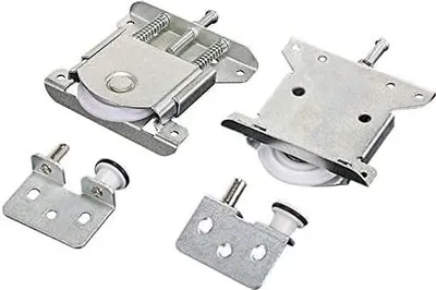 A set of four sliding door rollers on a white background.