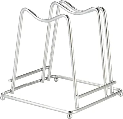 A silver metal rack for holding cutting boards.