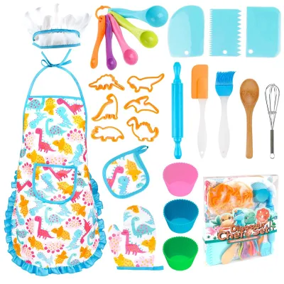 Immagine prodotto di Set da cucina giocattolo per bambini, con accessori per la cottura e un grembiule a tema dinosauri
