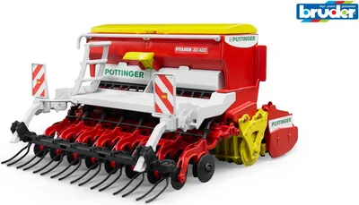 A toy agricultural seeder machine, a Bruder Pöttinger Vitasem 302ADD Kreiselegge, is displayed against a white background.