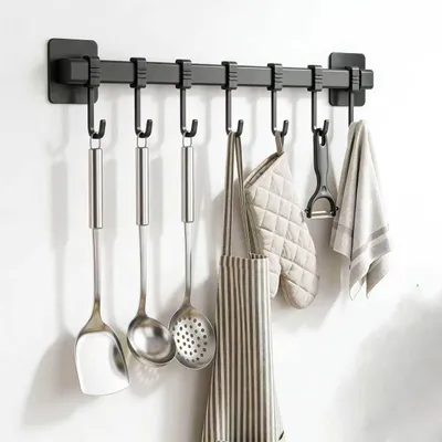 Produktbild von Selbstklebende Hakenleiste für die Küche ohne Bohren, Wandhalterung mit 8 Haken für Küchenutensilien, Bad und Garderobe (Schwarz)