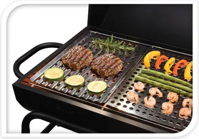 A close-up shot of a grill with food being cooked on it.