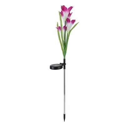 A solar-powered garden light shaped like a flower.