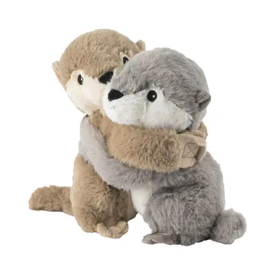 Two stuffed otters hugging each other.