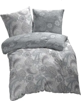 A bedding set with a paisley floral pattern.