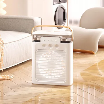 A portable air cooler sits on a wooden floor next to a sofa and in front of a washing machine.