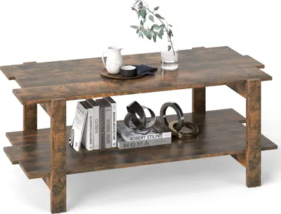 A two-tiered coffee table with decorative items on display.