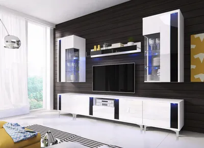 A modern living room with a wall-mounted entertainment unit and TV.
