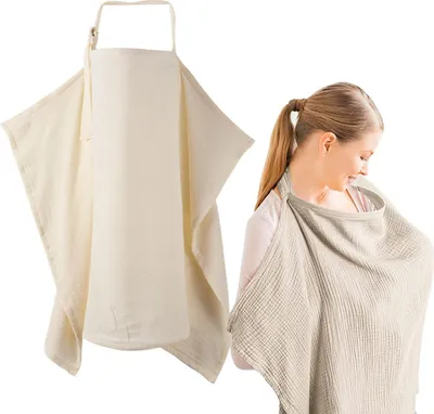 A nursing cover is shown both folded and being worn by a woman.