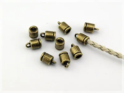 Produktbild von Vintageparts 10 Endkappen antik Bronze 10 x 6 mm für 4 mm Bänder