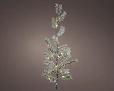 A single, artificial Christmas tree branch with lights.