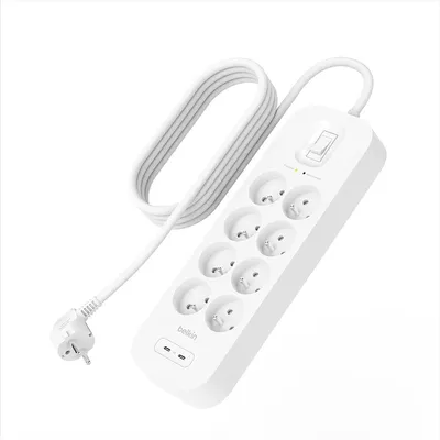 A white Belkin surge protector with multiple outlets and USB ports, shown on a white background.