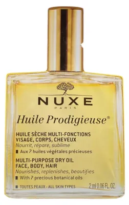 Immagine prodotto di Set Nuxe Huile Prodigieuse, olio multiuso nutriente per corpo, viso e capelli, 12 flaconi da 2 ml *Campione