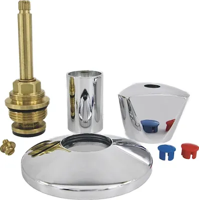 A collection of plumbing faucet parts laid out on a white background.