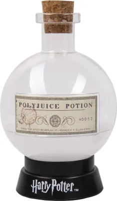 A clear, studio shot of a Polyjuice Potion bottle from Harry Potter, displayed on a black base with the Harry Potter logo.