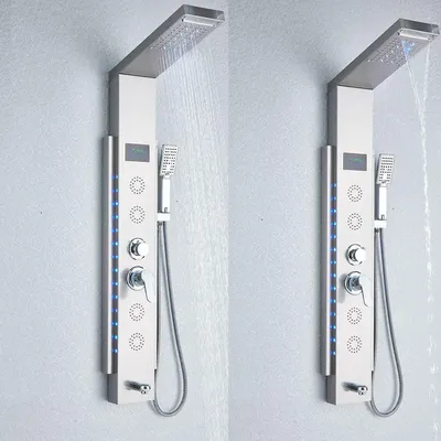 A modern stainless steel shower panel with LED lights and multiple shower functions, mounted on a light gray wall.