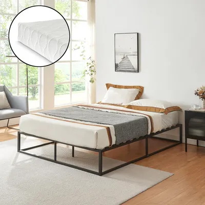 A bedroom scene with a bed frame and mattress.