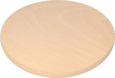 A round wooden cutting board on a white background.