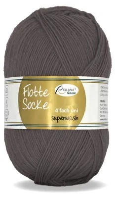 A ball of dark gray yarn with a label wrapped around it.