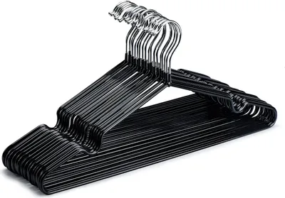 A stack of black metal hangers shown from a diagonal angle.