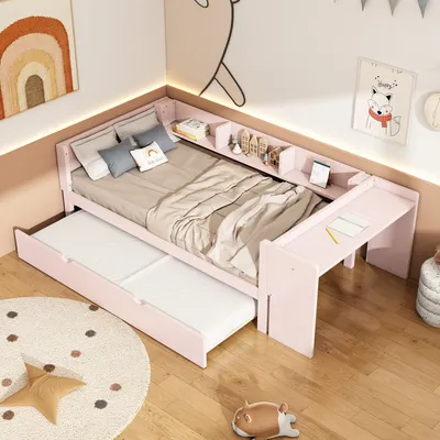 A child's bedroom with a pink bed, pull-out trundle, and integrated desk and shelves.