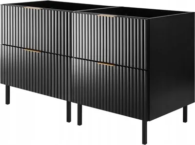 A black vanity cabinet with fluted doors and gold handles, shown from a three-quarter angle on a white background.