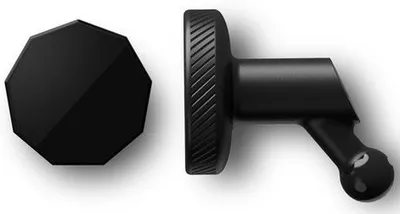 A black magnetic mount and a black octagonal disc are shown against a white background.