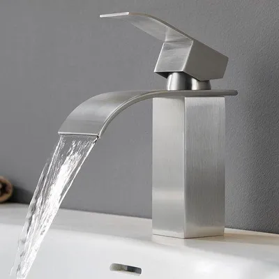 Immagine prodotto di Miscelatore monocomando per lavabo Unyqoos® con design a cascata, in acciaio inossidabile spazzolato (senza piombo), altezza 85 mm, diametro di installazione 33–38 mm, valvola in Vetroceramica