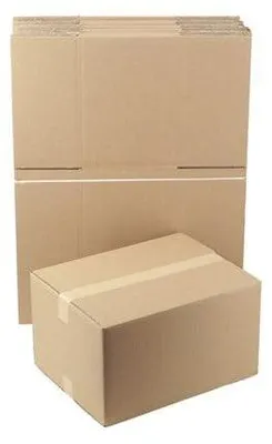 A stack of cardboard boxes with one box in the foreground.