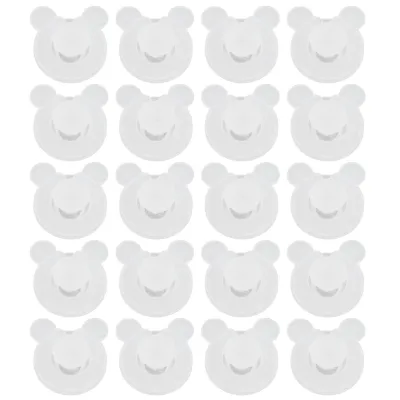 A grid of white, bear-shaped clips on a white background.