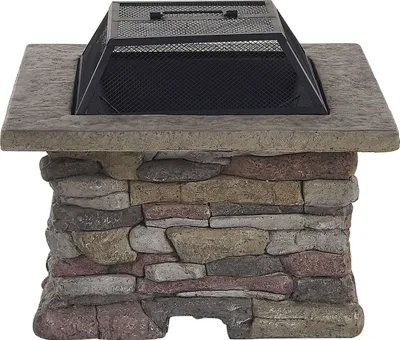 A square fire pit with a stone-like base and a metal grate on top.