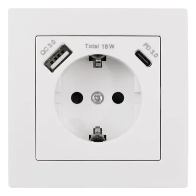 A white wall socket with integrated USB ports.