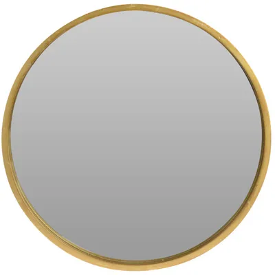 A round mirror with a golden frame against a white background.