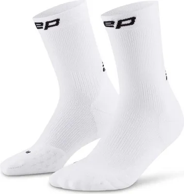 Zdjęcie produktu dla Damskie skarpety kompresyjne sportowe do połowy łydki CEP Core Run białe