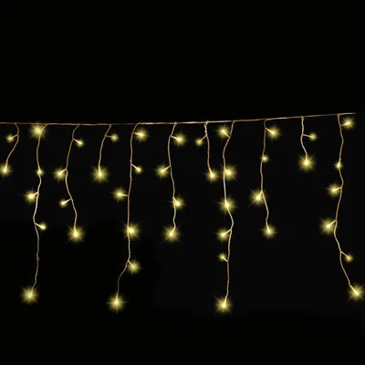 A string of icicle-shaped LED lights against a black background.