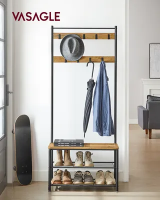 A hall tree with a hat, umbrella, jacket, and shoes displayed.
