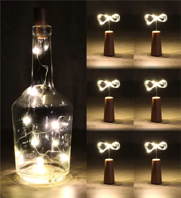 Produktbild von com-four® 9x LED-Flaschen-Licht - Korken-Lichterkette für innen, für leere Wein- und Sektflaschen - Mini-LED-Lichter mit Batteriebetrieb - Stimmungslicht in warm-weiß - Flaschenlichter