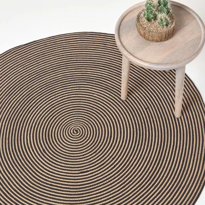 Produktbild von HOMESCAPES Handgewebter Teppich mit Spiralemuster in beige und schwarz, 120 cm rund