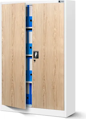 A white metal cabinet with wood-look doors, open to reveal blue binders inside.