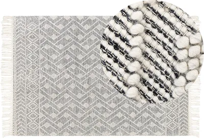 Produktbild von BELIANI Teppich Schwarz u. Weiß aus Wolle 160 x 230 cm Rechteckig Kurzflor mit Geometrischem Muster Fransen für Wohnzimmer Schlafzimmer Flur