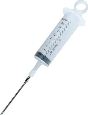 A close-up shot of a large syringe with a needle attached, isolated on a white background.