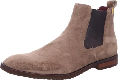 A single beige Chelsea boot is shown against a white background.