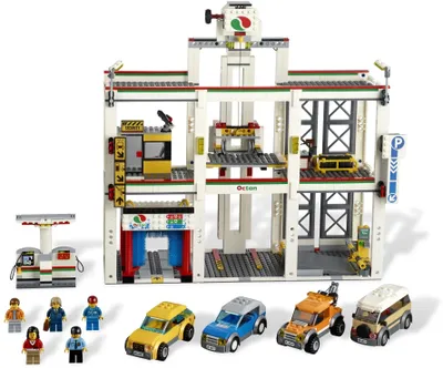 Produktbild von LEGO 4207 City Garage  LEGO Anzahl Minifiguren: 5, Thema: LEGO City, Veröffentlicht in: 2012, Verpackungsmaße (lxbxh): 58 x 38 x 11 cm, Zahl: 4207-1, EAN: 5702014840980, UPC: 673419167956, Gewicht: 2.157 KG, Anzahl Teile: 912, Anzahl Anleitungen: 5, Altersberatung: 6+