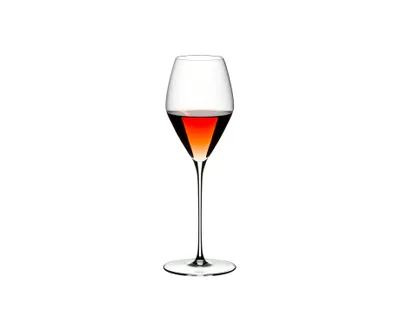 A single glass of red wine on a white background.